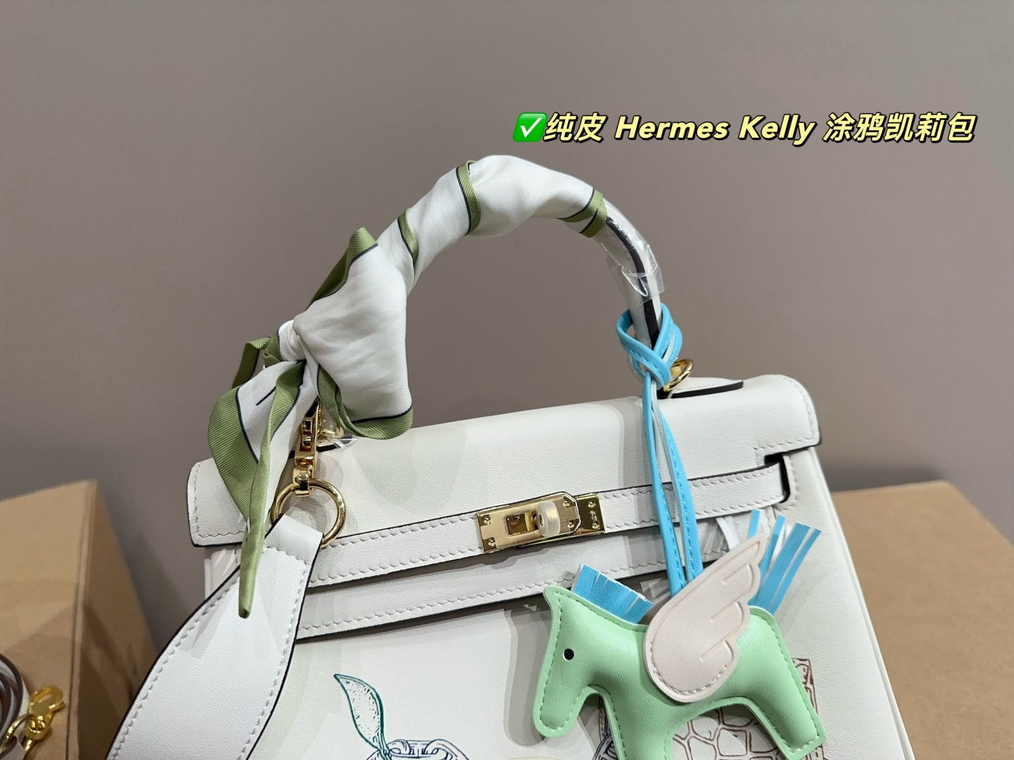 Her new arrival Kelly bag size: 24*18 cm