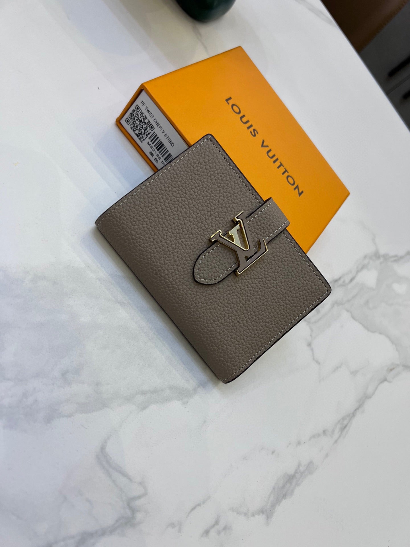 Louis Vertical CP Taurillon leather wallet size : 9*12*10 cm
