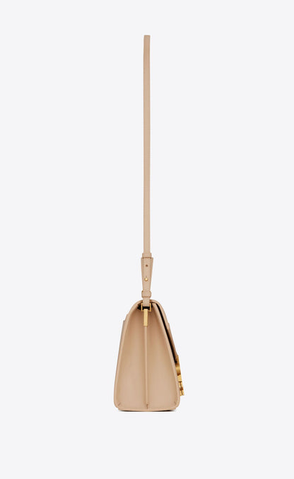 Y Cassandra Medium Top Handle in Grain de Poudre Embossed Leather